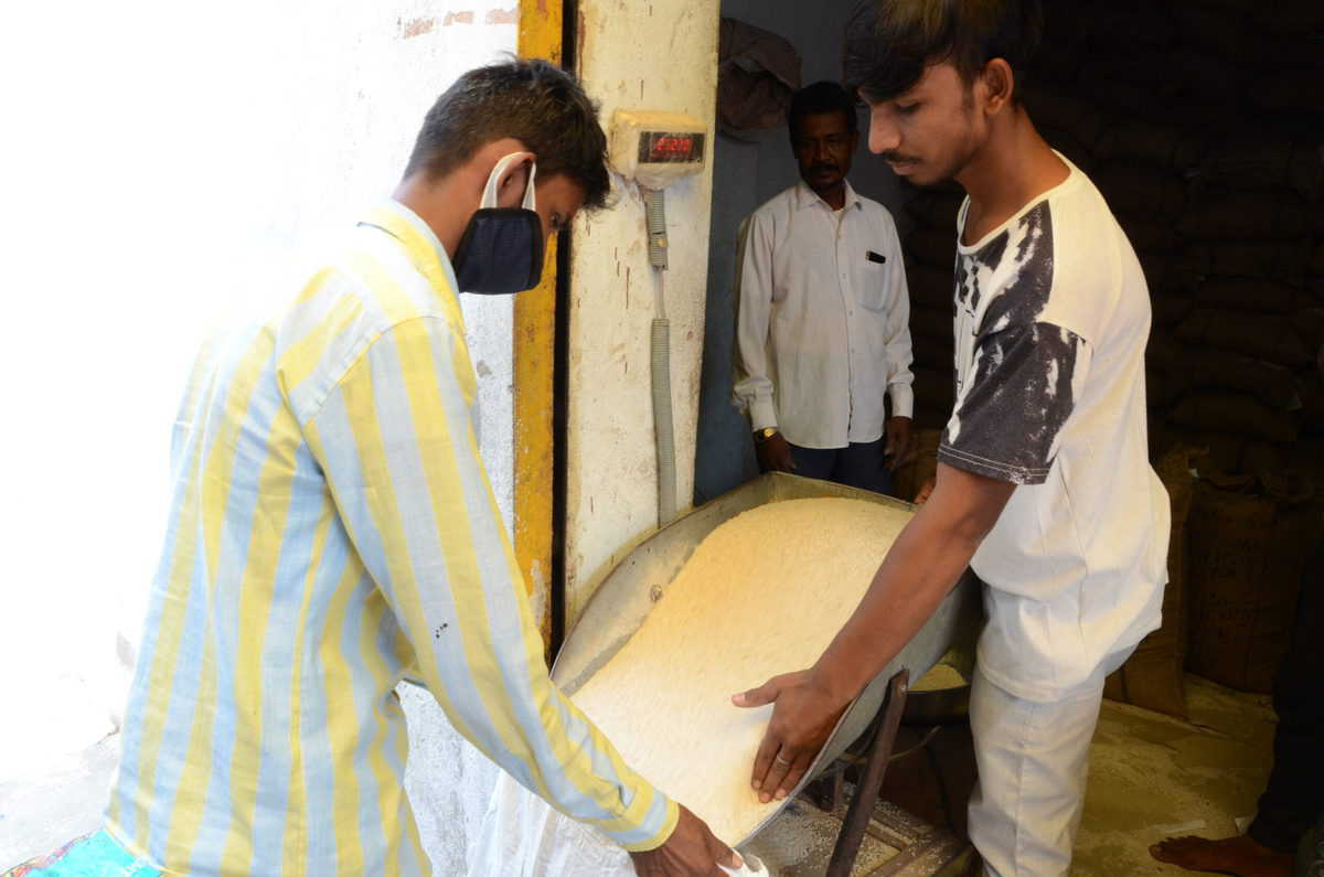 Hyderabad: People collection ration at ration stores amid lockdown. Photo: Mohammed Hussain