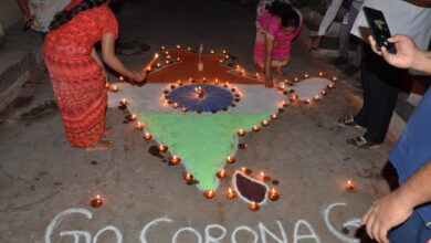 People light candles, diyas to mark fight against COVID-19