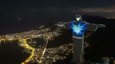 Christ the Redeemer statue wearing a protective mask in Brazil
