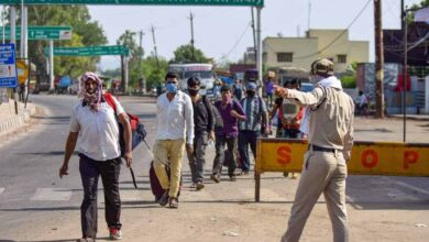 Migrant workers break through the barricades in UP
