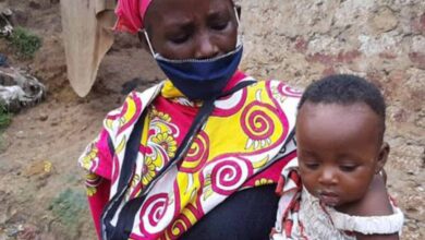 Mother pretends to boil stones as food for her starving children