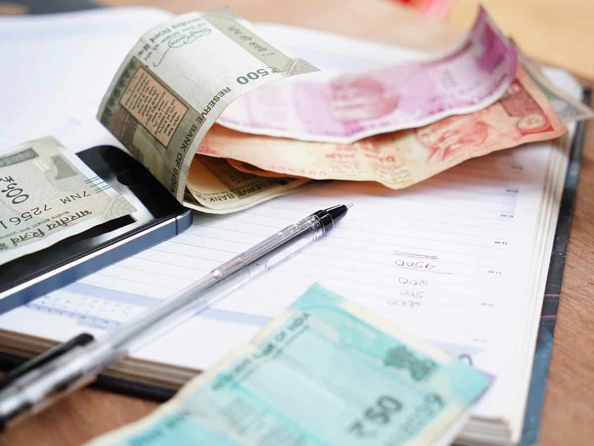 Rupee slumps 87 paise to close at 73.38 against US dollar