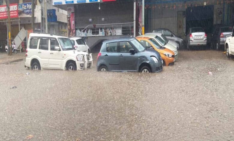 Hyderabad rain leaves puddles on roads