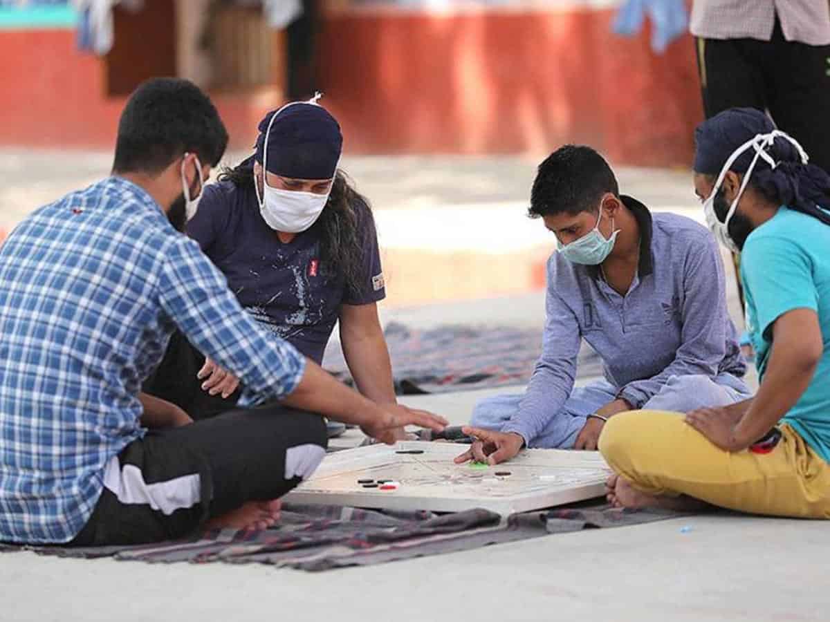 In this file photo, inmates wearing protective masks play carrom inside a jail during the nationwide lokcdown to curb the spread of coronavirus, in Jammu. (PTI)