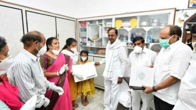 Telangana CM hands over cheques, job letter to martyred Colonel's kin