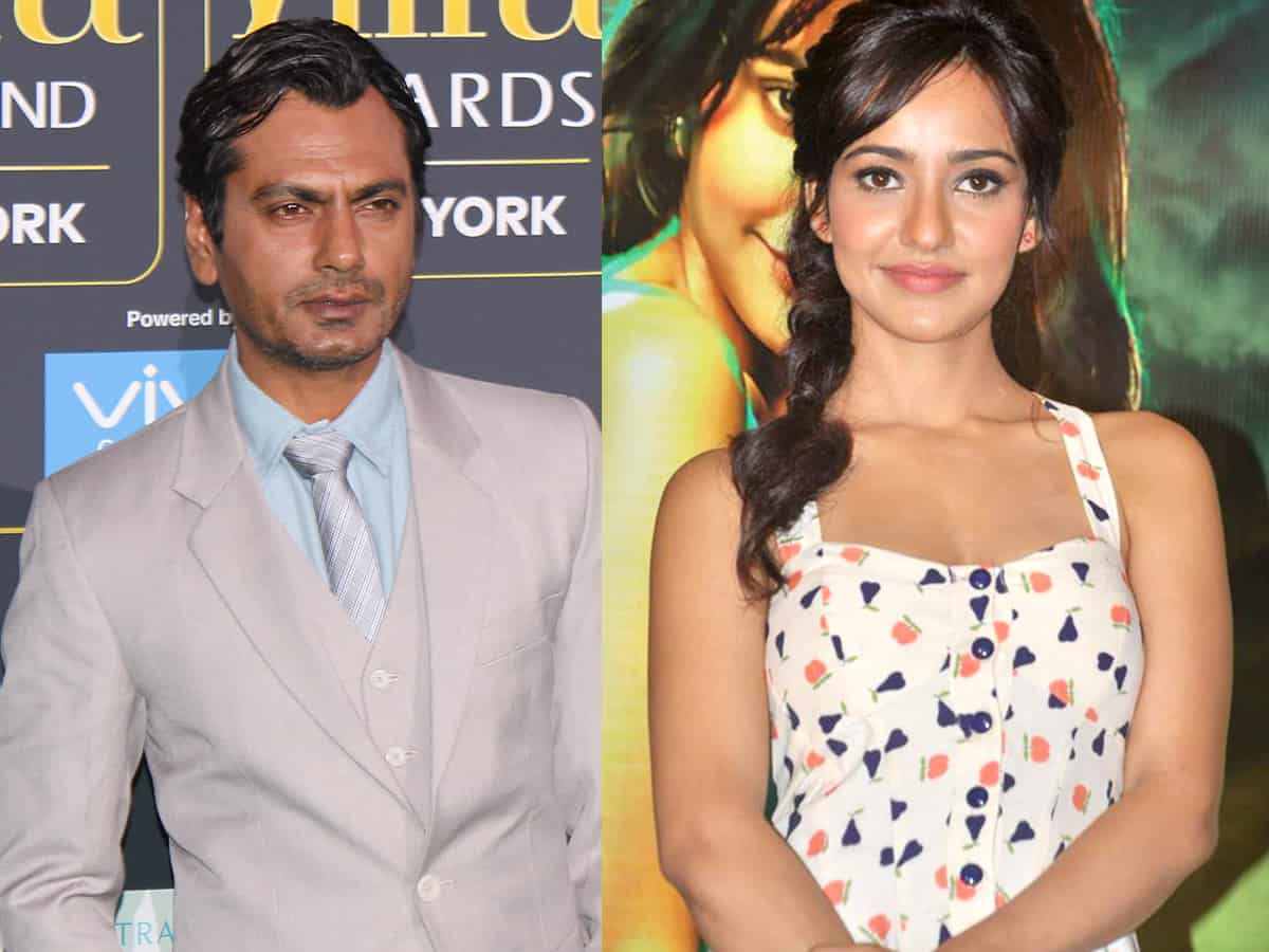 Nawazuddin Siddiqui, Neha Sharma (Image courtesy: Twitter) Nawazuddin Siddiqui, Neha Sharma to star in rom-com 'Jogira Sara Ra Ra'