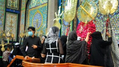 Image of Shia Muslim community members at the Baadshahi Ashurkhana in Hyderabad.