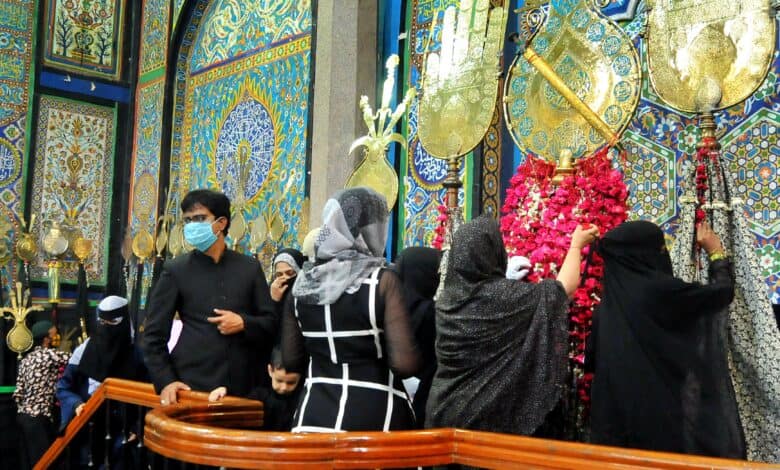 Image of Shia Muslim community members at the Baadshahi Ashurkhana in Hyderabad.