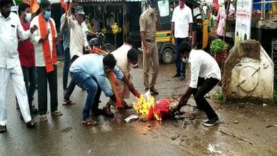 BJP workers burn effigy of Civil Supplies minister after remarks on temple attacks