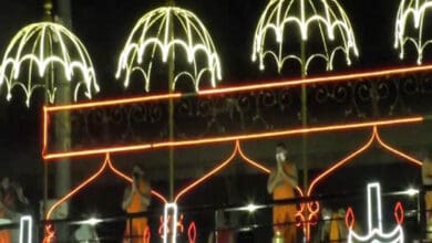 Priests offer 'Pancha Haarati' to Krishna river at Vijayawada's Durga ghat