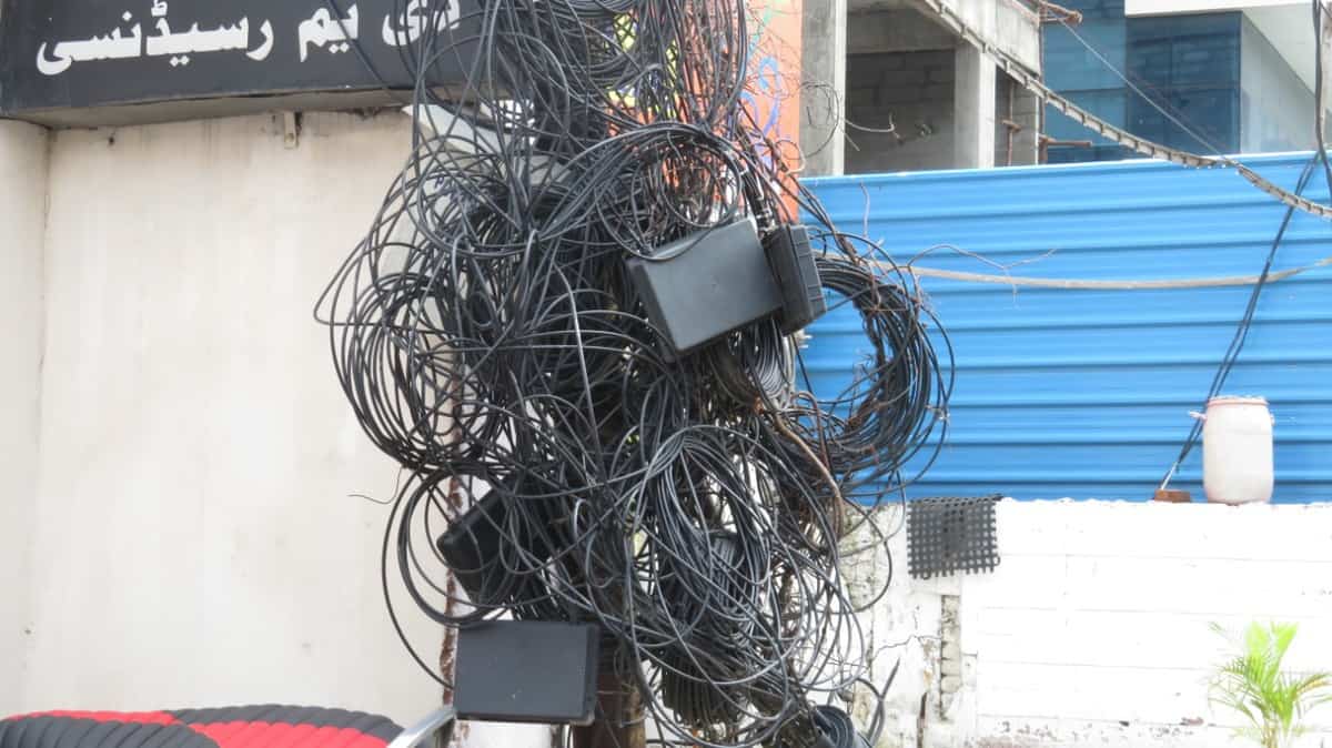 Hyderabad Entangled cable wires left hanging from electric poles