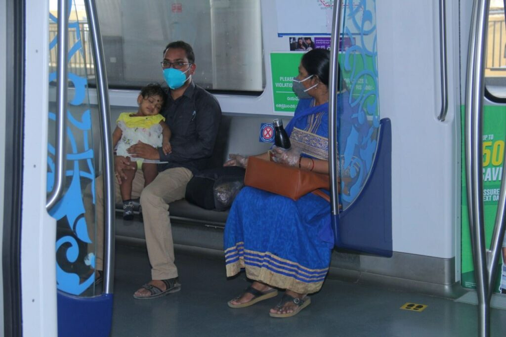 Passengers travelling in Hyderabad Metro Rail