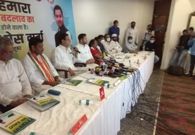 Grand Alliance releases Bihar poll manifesto, pledges change (Ld)