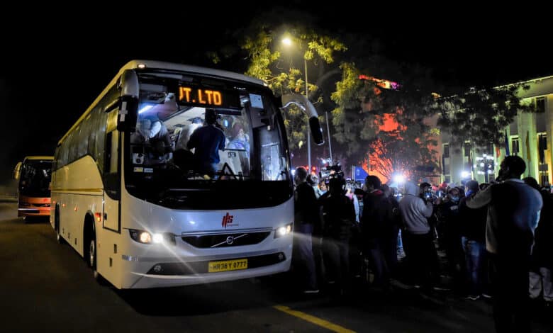 New Delhi: Representatives of various farmer unions leave in a bus after a meeting with Union Minister Narendra Singh Tomar over the Center's new farm laws, outside Vigyan Bhawan in New Delhi, Saturday, Dec. 5, 2020. (PTI Photo/Kamal Singh)