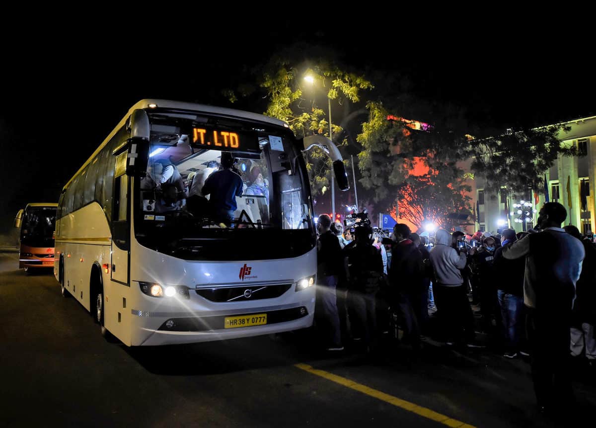New Delhi: Representatives of various farmer unions leave in a bus after a meeting with Union Minister Narendra Singh Tomar over the Center's new farm laws, outside Vigyan Bhawan in New Delhi, Saturday, Dec. 5, 2020. (PTI Photo/Kamal Singh)