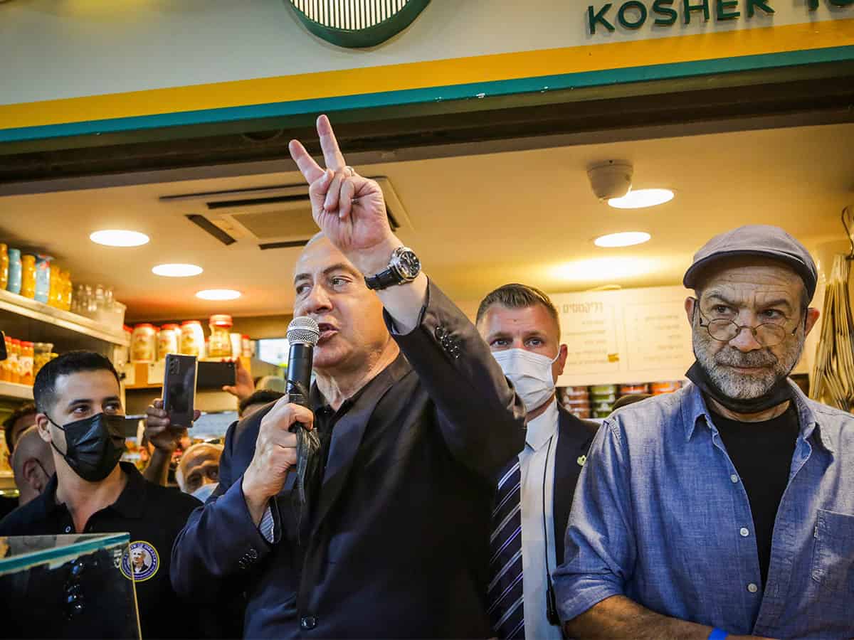 Israelis return to polling station to decide Netanyahu's fate