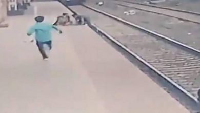 Man 'out-races' speeding train to save kid