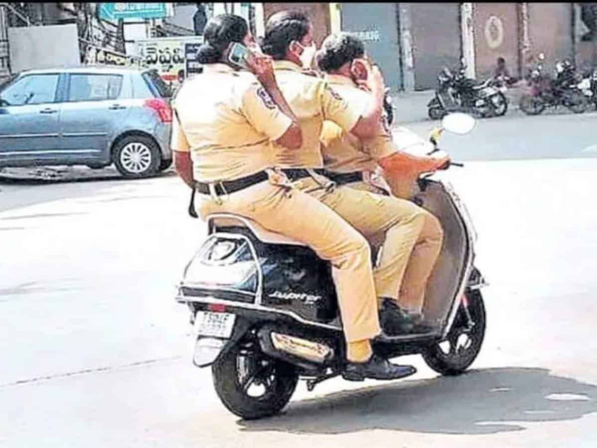Khammam: Three women constables fined for triple riding, without helmet, talking on phone