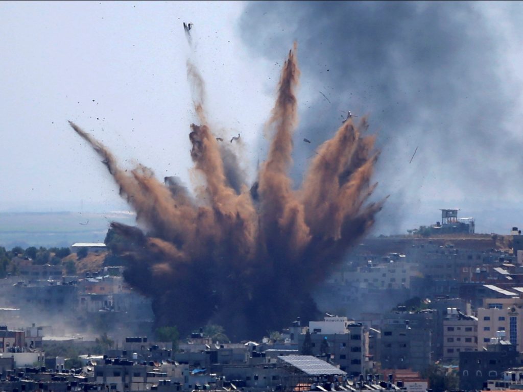 Medics: Israeli airstrikes kill 23 in downtown Gaza City