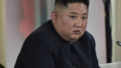 Kim seeks better ties with South, but slams US