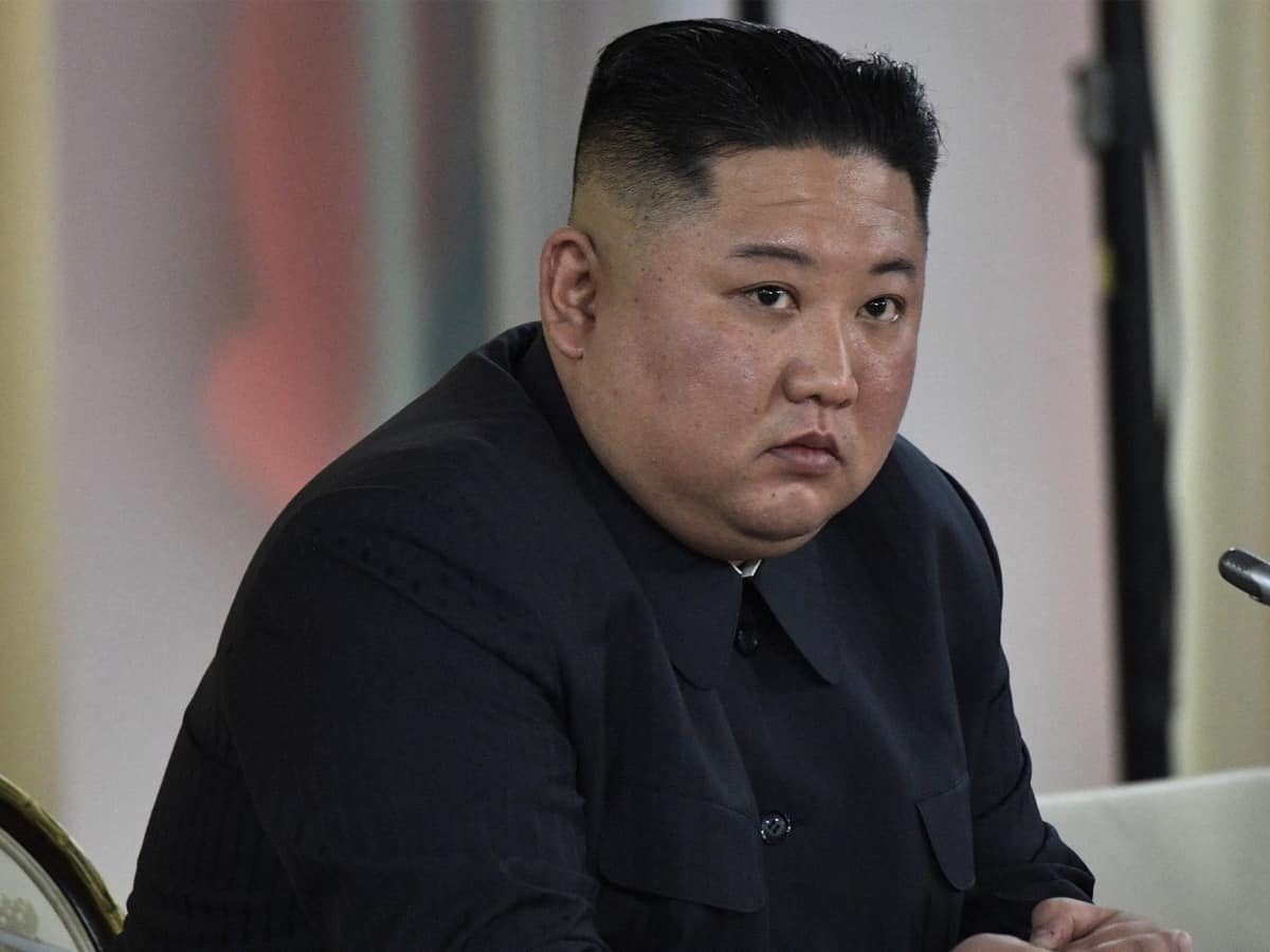 Kim seeks better ties with South, but slams US