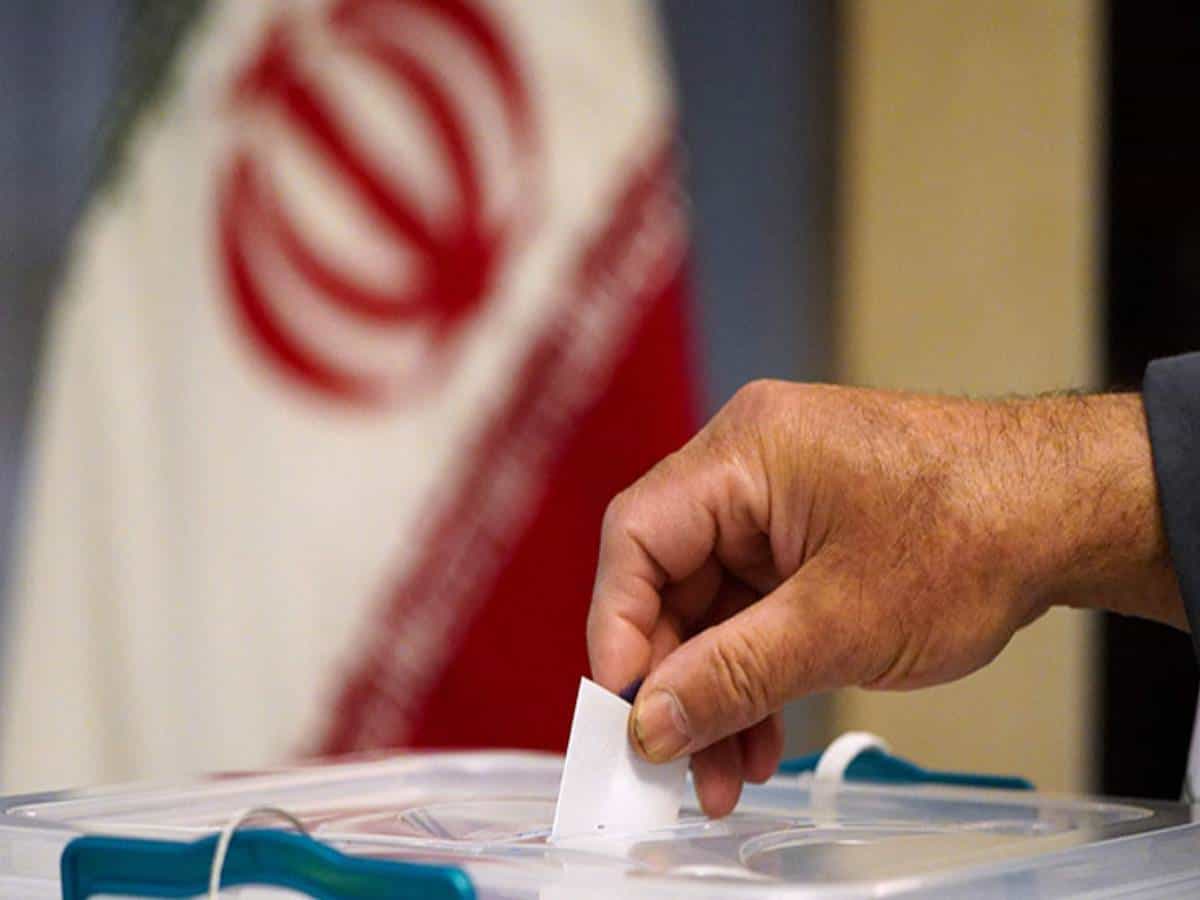 Iran votes in presidential poll tipped in hard-liner's favour