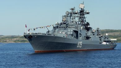 Russia says it may fire to hit intruding warships