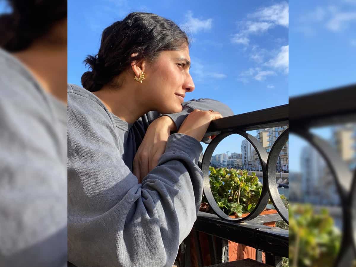 Kubbra Sait shares a cool picture against a wall mural