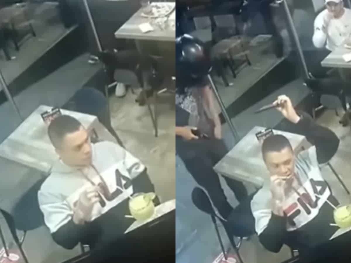 Viral video: Man continues eating chicken wings while robbery goes on