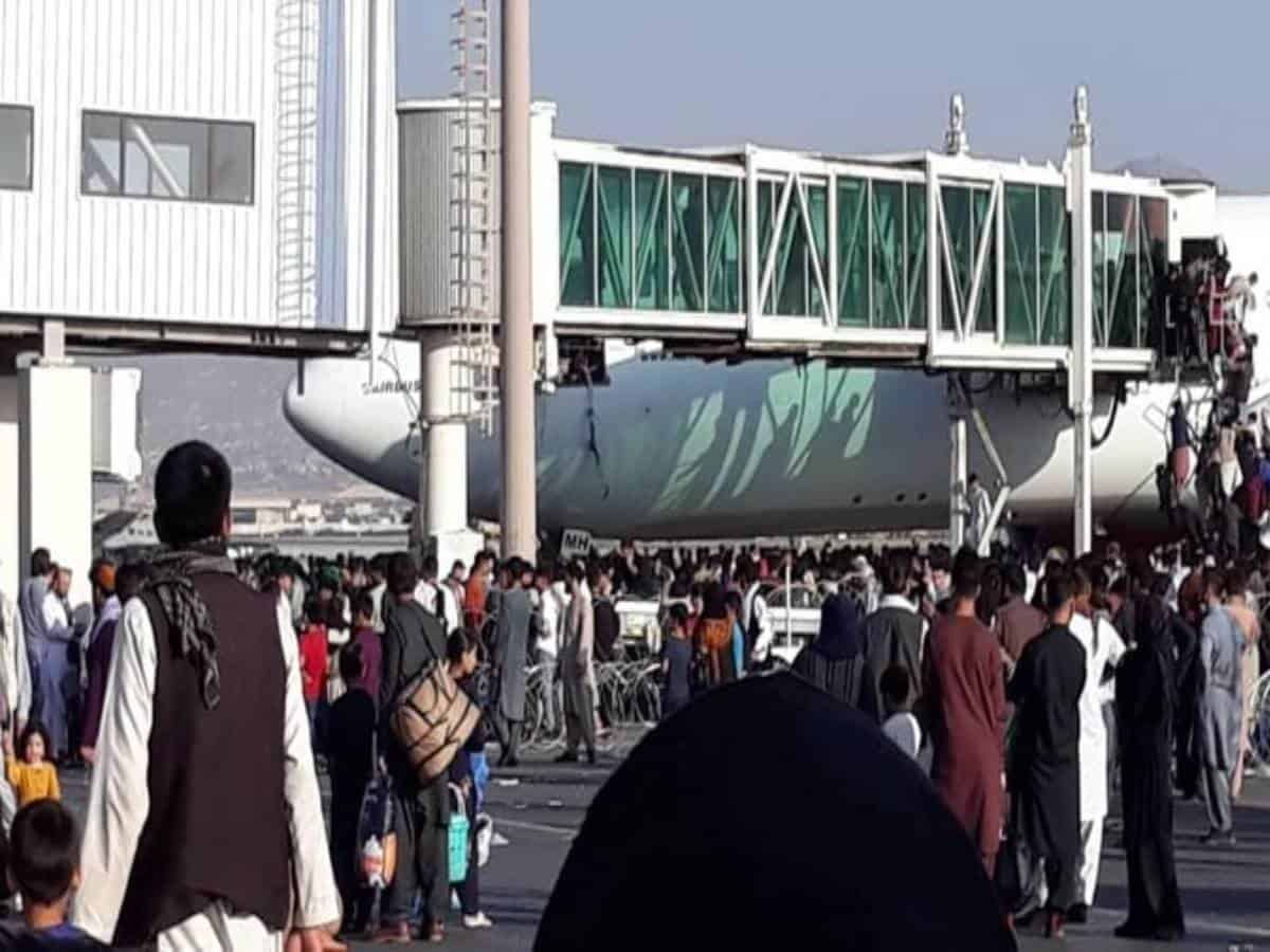 Chaos as people running around in Kabul airport to board flights