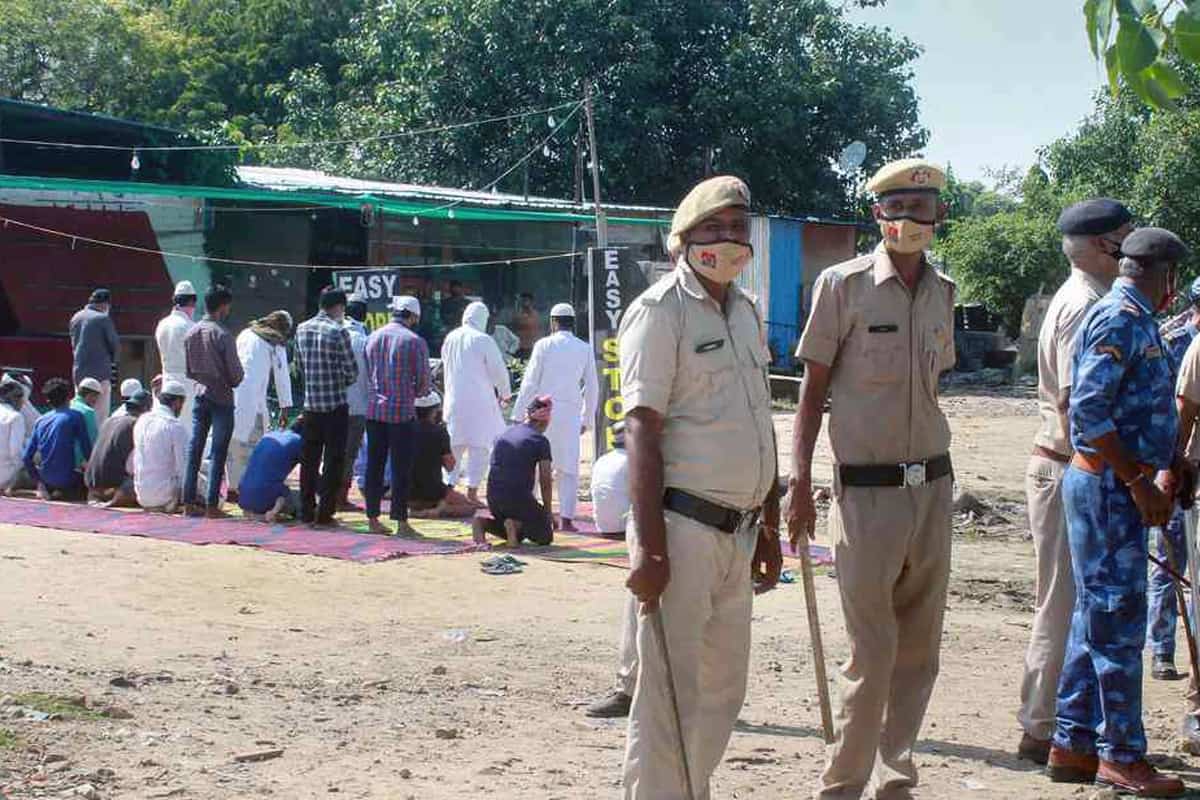 Prayers being held under police protection in Gurugram. (PTI Photo)