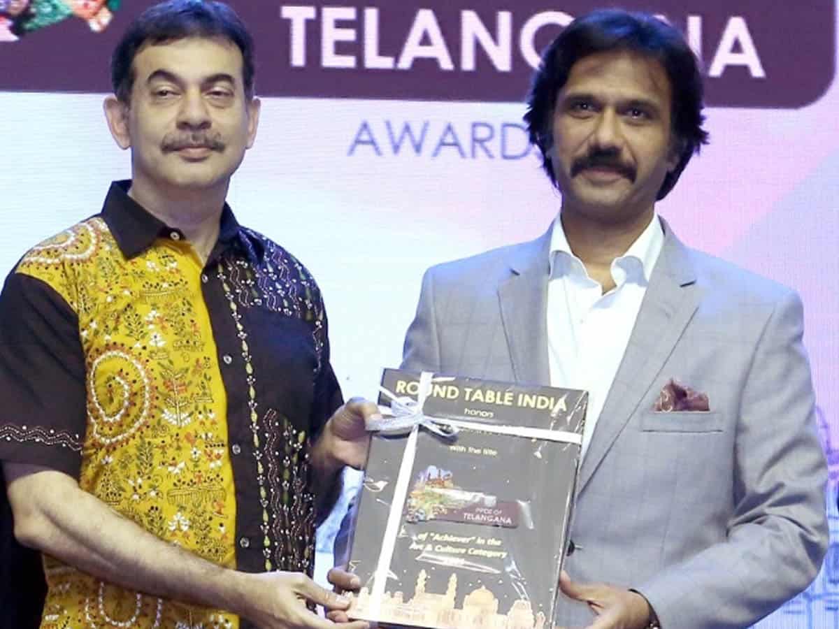 Mohammad Ali Baig receives 'Pride of Telangana' award