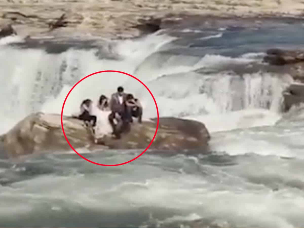 Couple gets stuck in waterfall during pre-wedding shoot, video goes viral