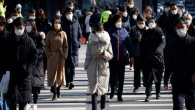 South Korea sees record virus jump as thousands take college exam