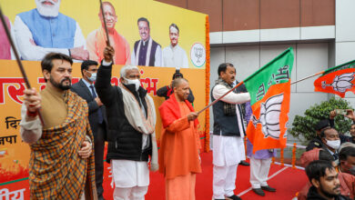 Uttar Pradesh Chief Minister Yogi Adityanath with Union Minister Anurag Thakur, Deputy CM Keshav Prasad Maurya and State BJP President Swatantra Dev Singh flags off the partys Prachar Rath (campaign vehicle) ahead of Assembly elections, in Lucknow,