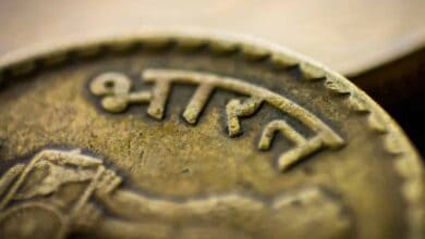 Rupee falls 11 paise to 76.35 against US dollar in early trade