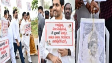 TDP legislators wash Andhra Pradesh CM's portrait with liquor