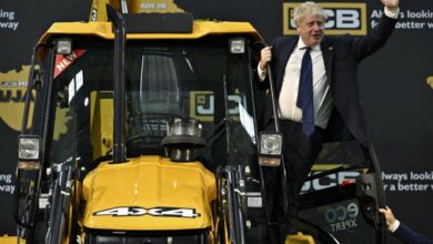 UK PM Boris Johnson climbs bulldozer at newly built JCB factory in Gujarat