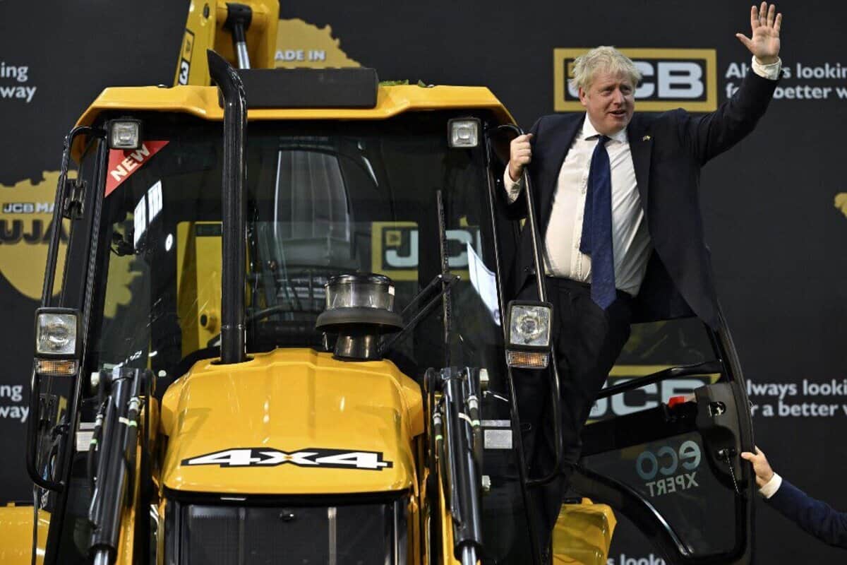 UK PM Boris Johnson climbs bulldozer at newly built JCB factory in Gujarat