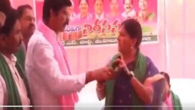 TRS MLA snatches mic from party MP during public meeting