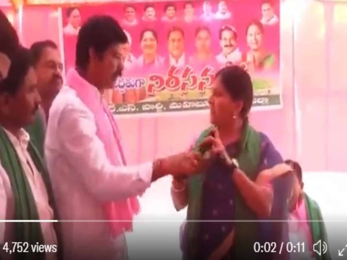 TRS MLA snatches mic from party MP during public meeting