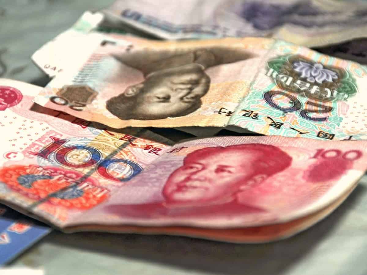 China's currency hits 18-month low against USD