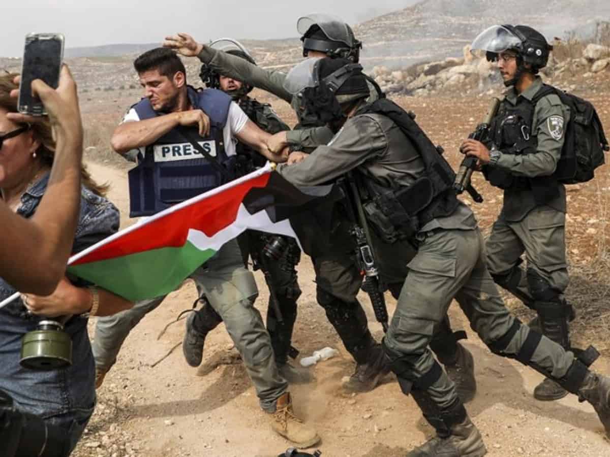 148 Zionist violations against Palestinian journalists in May