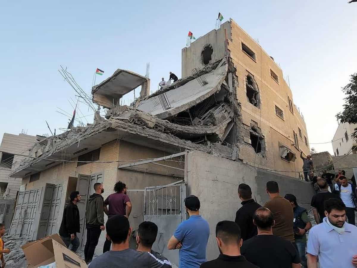 Israeli forces blew up home of Palestinian martyr, arrest his father