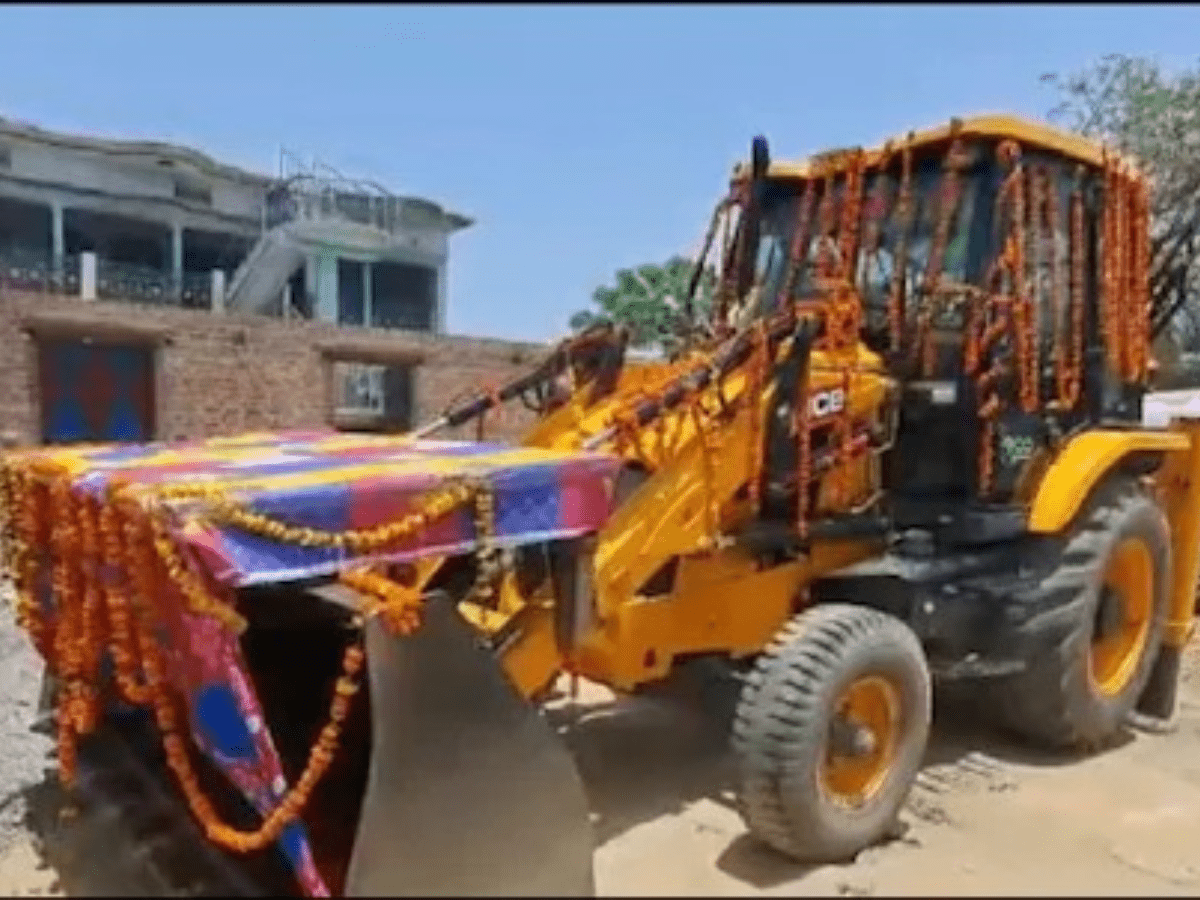 Groom prefers bulldozer over horse or car