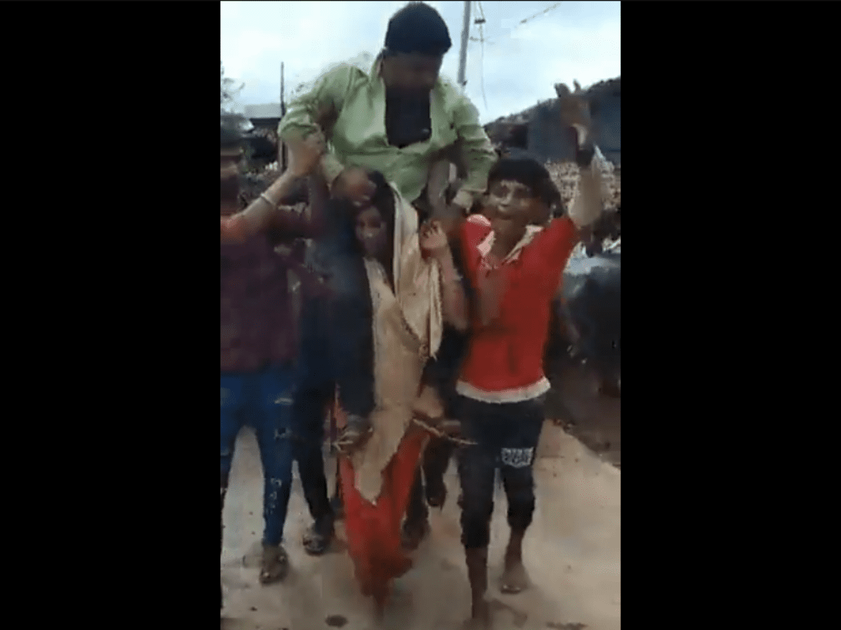 tribal woman was thrashed and forced to carry her husband on her shoulders wearing a garland of shoes in Madhya Pradesh's Dewas