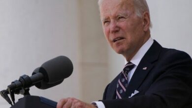 One year after Afghan war, Biden struggles to find footing