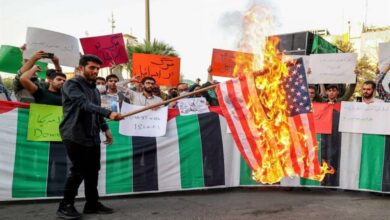 Iran hard-liners burn US flags, slam Biden's middle east visit