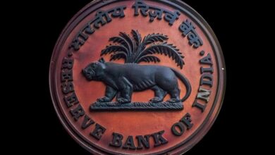 RBI unveils measures to check rupee fall; raises overseas borrowing limits for cos