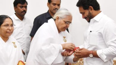 Andhra women ministers tie Rakhi to CM.